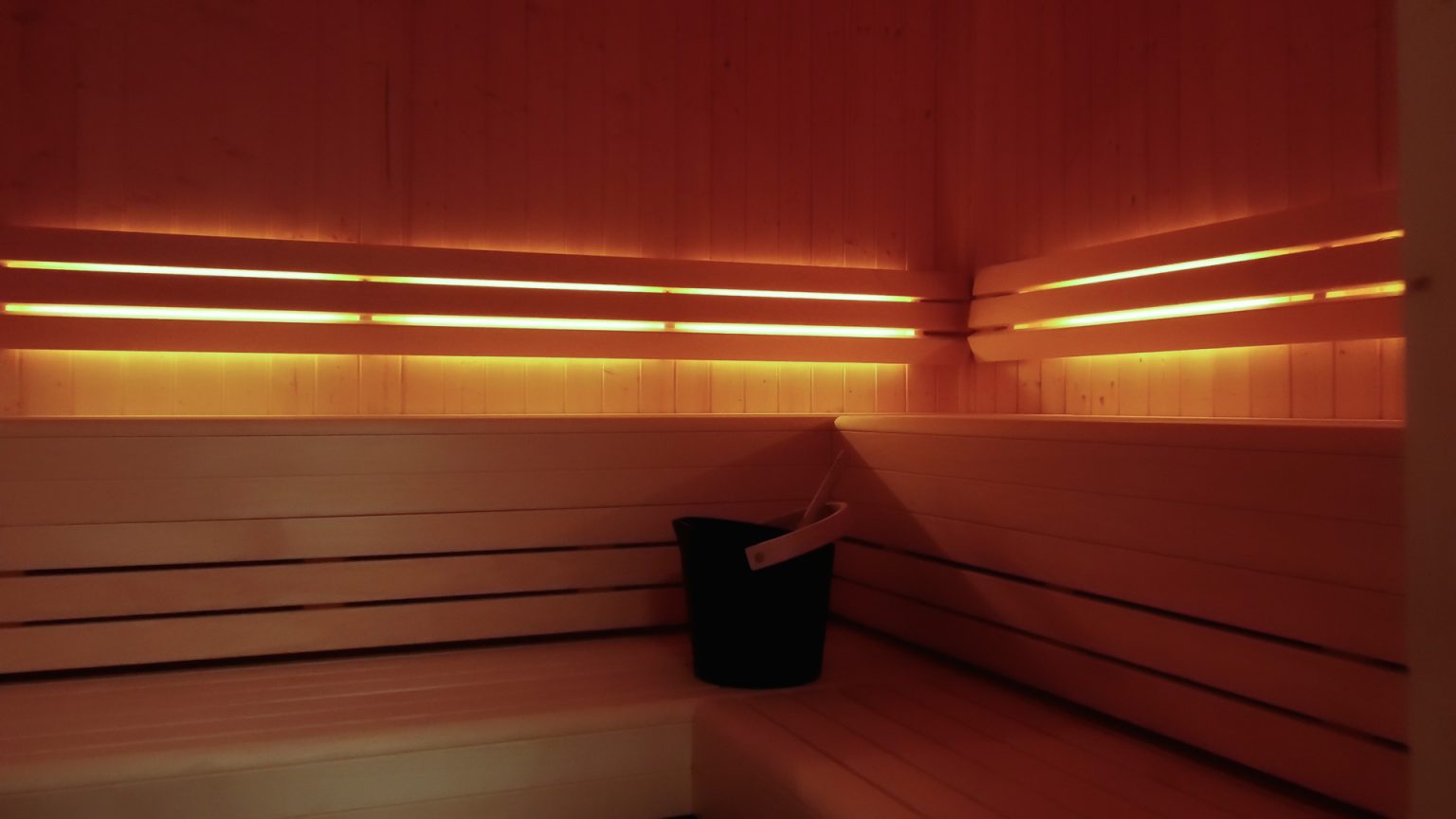 Warm timber interior of the club sauna